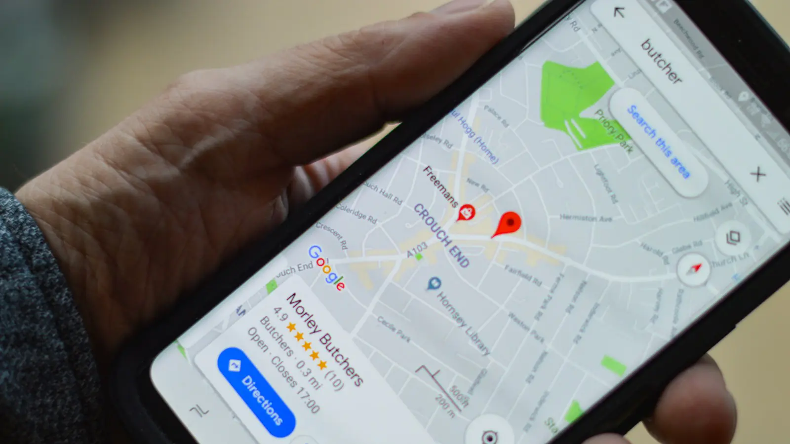 local SEO Perth — person holding black smartphone