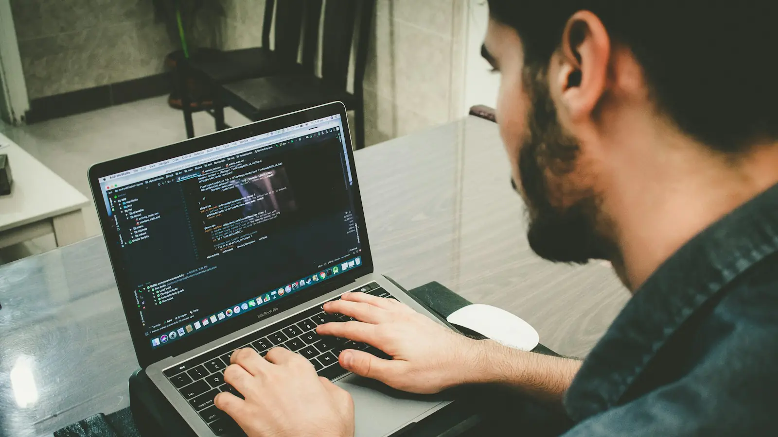 website design Perth — man programming using laptop